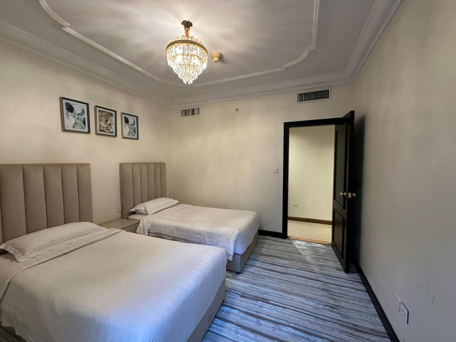 Zad Al Eman Suites Hotels Medina Ruang foto