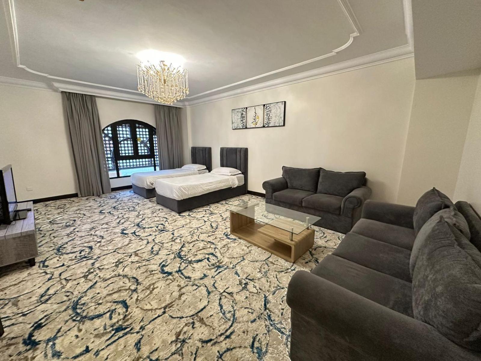 Zad Al Eman Suites Hotels Medina Ruang foto