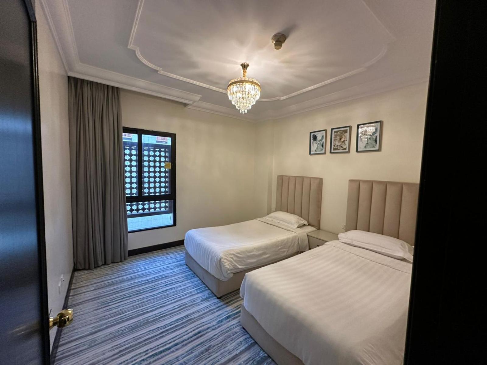 Zad Al Eman Suites Hotels Medina Ruang foto